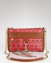 Woven Leather Clutch with long chain removable shoulder strap. front pocket. Top zip closure. Tassel on zipper. Interior zip pocket, 2 additional pockets, lined.