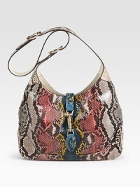 Python skin defines this roomy carryall.Adjustable and detachable shoulder strap, 8¾-19¾ dropPiston clasp closureOne inside zip pocketOne cell phone pocketOne PDA pocketLeather lining13W X 9H X 2¾DMade in Italy Python skin defines this roomy carryall.Adjustable and detachable shoulder strap, 8¾-19¾ dropPiston clasp closureOne inside zip pocketOne cell phone pocketOne PDA pocketLeather lining13W X 9H X 2¾DMade in Italy
