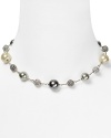 Embellished with delicate pearl and crystal stations, Carolee's illusion necklace sparkles with versatility -- elegant whether worn to dress up denim or enliven a classic white blouse.