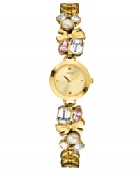 Adorn your wrists with pure charm with this eye-catching watch from GUESS. Adorn your wrists with pure charm with this eye-catching watch from GUESS.