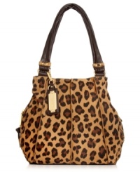Be spot on with your everyday accessorizing with this posh, leopard print shopper from Tignanello. Soft leather is bedecked with gleaming hardware and signature accents, while the interior is roomy enough to carry your essentials from work-to-weekend. Be spot on with your everyday accessorizing with this posh, leopard print shopper from Tignanello. Soft leather is bedecked with gleaming hardware and signature accents, while the interior is roomy enough to carry your essentials from work-to-weekend.