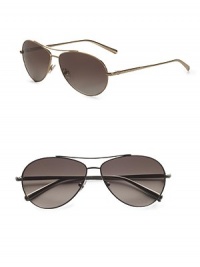 From the Waverly Collection. Titanium aviator features a sleek waverly temple. Available in silver with palladium electroplating and smoke double gradient lens or gold with 22k gold electroplating and brown double gradient lens. 100% UV protection Imported From the Waverly Collection. Titanium aviator features a sleek waverly temple. Available in silver with palladium electroplating and smoke double gradient lens or gold with 22k gold electroplating and brown double gradient lens. 100% UV protection Imported