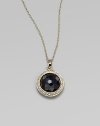 From the Lollipop Collection. A faceted black onyx, framed in diamonds, hanging on a graceful chain. Black onyx Diamonds, 0.14 tcw 18k yellow gold Chain length, about 16 with 2 extender Pendant diameter, about ½ Lobster clasp Imported