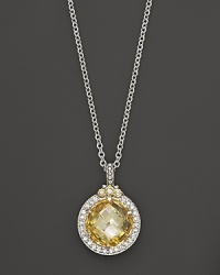 White sapphires frame a sparkling canary crystal on this Judith Ripka pendant necklace. White sapphires frame a sparkling canary crystal on this Judith Ripka pendant necklace.