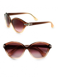 Iconic signature cable is subtly wrapped around the temples of this cat's-eye frame for a look of understated sophistication. Available in smokey quartz with brown-tan gradient lens. Cable accented temples100% UV protectionImported Iconic signature cable is subtly wrapped around the temples of this cat's-eye frame for a look of understated sophistication. Available in smokey quartz with brown-tan gradient lens. Cable accented temples100% UV protectionImported