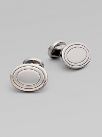 Polished ovals of sterling silver add a tailored touch to shirt cuffs.Sterling silver About ¾ X ½L Made in the United Kingdom Polished ovals of sterling silver add a tailored touch to shirt cuffs.Sterling silver About ¾ X ½L Made in the United Kingdom