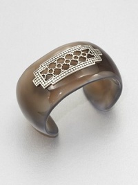 From the Dot Collection. This nature-inspired style from a socially and environmentally responsible brand features a stunning agate cuff decorated with a delicate, sterling silver cutout center surrounded by a dotted 18k gold border. AgateSterling silver18k goldDiameter, about 2.3Slip-on styleImported From the Dot Collection. This nature-inspired style from a socially and environmentally responsible brand features a stunning agate cuff decorated with a delicate, sterling silver cutout center surrounded by a dotted 18k gold border. AgateSterling silver18k goldDiameter, about 2.3Slip-on styleImported
