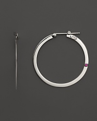 Flat, gleaming circles of 18K. white gold from Roberto Coin. Flat, gleaming circles of 18K. white gold from Roberto Coin.