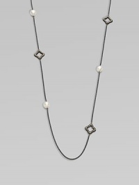 From the Midnight Pearl Collection. This lovely style features diamond accents, quatrefoils and lustrous pearl stations on a sleek, blackened sterling silver box chain. Blackened sterling silverWhite cultured South Sea pearlsDiamonds, .6 tcwLength, about 40Toggle closureImported From the Midnight Pearl Collection. This lovely style features diamond accents, quatrefoils and lustrous pearl stations on a sleek, blackened sterling silver box chain. Blackened sterling silverWhite cultured South Sea pearlsDiamonds, .6 tcwLength, about 40Toggle closureImported