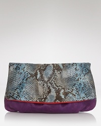From dusk til dawn, this leather clutch from Elie Tahari is the ultimate dress upper. Super soft and sized for the essentials, it looks effortless under your arm. From dusk til dawn, this leather clutch from Elie Tahari is the ultimate dress upper. Super soft and sized for the essentials, it looks effortless under your arm.
