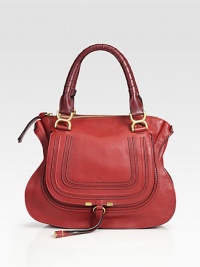 Calfskin leather in a softly contoured shape with chic stitching and wrapped handles.Double top handles, 6 drop Top zip closure Hidden open pocket under outside flap One inside zip pocket One inside open pocket Cotton lining 15W X 12¼H X 4½D Made in Italy Calfskin leather in a softly contoured shape with chic stitching and wrapped handles.Double top handles, 6 drop Top zip closure Hidden open pocket under outside flap One inside zip pocket One inside open pocket Cotton lining 15W X 12¼H X 4½D Made in Italy