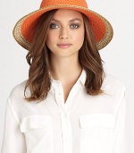 This dramatic, packable straw topper features signature logo rivets, elasticized inner band and an oversized, sloped brim for maximum sun protection and style.Brim, about 4.25Elasticized inner band fits most95% UVA/UVB protectionPolypropylene/polyesterSpot cleanImported and hand-finished in the USA