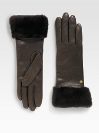 Durable deerskin leather accented with luxurious cashmere lining and shearling sheepskin cuff.Metal logo detailAbout 11 longSpecialist dry cleanImportedFur origin: Spain Durable deerskin leather accented with luxurious cashmere lining and shearling sheepskin cuff.Metal logo detailAbout 11 longSpecialist dry cleanImportedFur origin: Spain