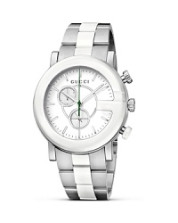 A stainless steel and white ceramic bracelet lends a timeless look to a chronograph Gucci watch. A stainless steel and white ceramic bracelet lends a timeless look to a chronograph Gucci watch.