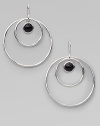 From the Scultura Collection. Double circles of polished sterling silver surround a center drop of smooth black onyx.Black onyx Sterling silver Diameter, about 2¼ Ear wire Imported