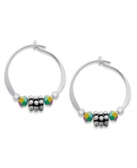 Austrian crystal and daisy-shaped beads adorn these petite hoop earrings by Jody Coyote. Set in sterling silver. Approximate diameter: 5/8 inch. Austrian crystal and daisy-shaped beads adorn these petite hoop earrings by Jody Coyote. Set in sterling silver. Approximate diameter: 5/8 inch.