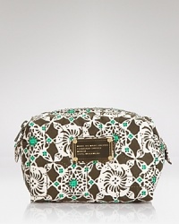 Hit print with this nylon cosmetics case from MARC BY MARC JACOBS, in a freshly minted motif and purse-perfect size. Hit print with this nylon cosmetics case from MARC BY MARC JACOBS, in a freshly minted motif and purse-perfect size.