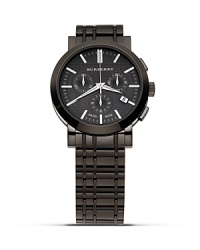 This modern Burberry chronograph watch features slick stainless steel, and a subtle, check embossed face. This modern Burberry chronograph watch features slick stainless steel, and a subtle, check embossed face.