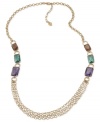A sideways glance reveals a stunning statement. This necklace from Carolee is crafted from gold-tone mixed metal with multicolor glass stones along the side for a vibrant touch. Approximate length: 24 inches. Approximate drop: 1/8 inch.