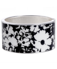 Infuse your look with the bold colors and exotic prints of Brasil. Crafted in silver tone mixed metal Haskell's Floral bangle features black and white flower details and a hinge clasp. Approximate diameter: 2-1/2 inches. Approximate length: 8 inches. Item comes packaged in a turquoise gift box. Infuse your look with the bold colors and exotic prints of Brasil. Crafted in silver tone mixed metal Haskell's Floral bangle features black and white flower details and a hinge clasp. Approximate diameter: 2-1/2 inches. Approximate length: 8 inches. Item comes packaged in a turquoise gift box.