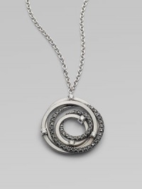 Sparkle in this white and black diamond accented 18k white gold pendant with interlocking rings on a link chain. 18k white goldWhite and black diamonds, .48 tcwLength, about 16½Pendant size, about 1Lobster clasp closureMade in Italy Sparkle in this white and black diamond accented 18k white gold pendant with interlocking rings on a link chain. 18k white goldWhite and black diamonds, .48 tcwLength, about 16½Pendant size, about 1Lobster clasp closureMade in Italy