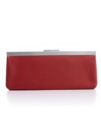 Calvin Klein gives a modern interpretation to the classic clutch. Available in bright crimson, glossy silver or cracked black or coordinate with any elegant evening look. Calvin Klein gives a modern interpretation to the classic clutch. Available in bright crimson, glossy silver or cracked black or coordinate with any elegant evening look.