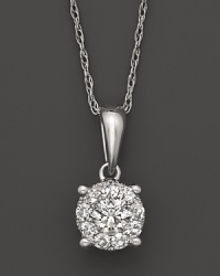 Faceted, glittering diamond cluster pendant in 14K. white gold. Faceted, glittering diamond cluster pendant in 14K. white gold.