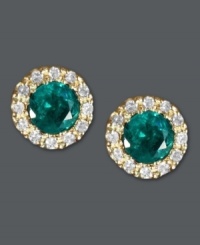 Put the green in your glamour. Effy Collection's dazzling button stud earrings feature round-cut emeralds (3/4 ct. t.w.) surrounded by halos of round-cut diamonds (1/8 ct. t.w.). Crafted in a 14k gold post setting. Approximate diameter: 1/4 inch.