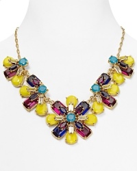 The floral motif makes an entrance on this kate spade new york bib necklace, which features a statement-making strand of colorful petals strung on a gold plated chain. The floral motif makes an entrance on this kate spade new york bib necklace, which features a statement-making strand of colorful petals strung on a gold plated chain.