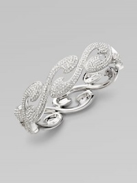 EXCLUSIVELY AT SAKS. Dazzling wave-shaped swirls set with pavé crystals form a head-turning bangle bracelet.Crystal Rhodium plated Diameter, about 2¼ Hinged with push-lock clasp Imported