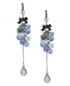 Go ahead, embellish a little. These Betsey Johnson earrings feature clusters of faceted blue and clear glass beads, a silver tone flower charm with crystal accents, a linear chain with blue-colored teardrop crystal, a hematite-plated bow accent and a small crystal accent at post. Crafted in a silver tone mixed metal setting. Approximate drop: 4 inches.