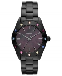 A glistening rainbow of crystals bring a charming touch to this DKNY watch. A glistening rainbow of crystals bring a charming touch to this DKNY watch.