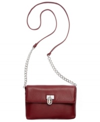 Carry off this season's chicest silhouette with this irresistible crossbody from Calvin Klein. Outfitted with signature hardware and ladylike chain-link details, it's perfectly sized for all your day-to-night essentials. Carry off this season's chicest silhouette with this irresistible crossbody from Calvin Klein. Outfitted with signature hardware and ladylike chain-link details, it's perfectly sized for all your day-to-night essentials.