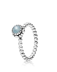 This birthstone ring features a beaded silver band with a polished aquamarine solitaire. Perfect worn on its own or stacked with other PANDORA pieces. This birthstone ring features a beaded silver band with a polished aquamarine solitaire. Perfect worn on its own or stacked with other PANDORA pieces.