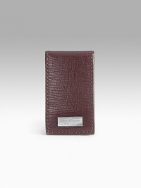 Stamped calfskin money clip with magnetic closure. 1¼W X 2¾H Made in Italy Stamped calfskin money clip with magnetic closure. 1¼W X 2¾H Made in Italy