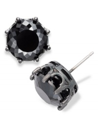 Black is back in this pair of oversized stud earrings from Juicy Couture. Cast in silver tone brass crowns, the faceted jet black cubic zirconia (8 ct. t.w) add a sense of intrigue and style. Approximate diameter: 3/8 inch. Black is back in this pair of oversized stud earrings from Juicy Couture. Cast in silver tone brass crowns, the faceted jet black cubic zirconia (8 ct. t.w) add a sense of intrigue and style. Approximate diameter: 3/8 inch.
