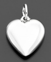 Simple, elegant and pure. This beautiful heart charm is crafted in sterling silver by Rembrandt Charms. Approximate drop: 3/4 inches.