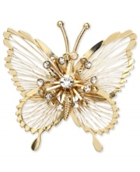 Fashion that blooms from Jones New York. This elegant pin is styled in a butterfly design and is embellished with glass accents. Crafted in gold tone mixed metal. Approximate length: 2 inches. Includes gift box. Fashion that blooms from Jones New York. This elegant pin is styled in a butterfly design and is embellished with glass accents. Crafted in gold tone mixed metal. Approximate length: 2 inches. Includes gift box.