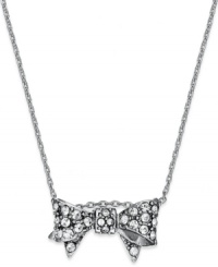 Make a wish! This darling bow pendant necklace from Juicy Couture gleams with crystal accents and endless appeal. Crafted in silver tone mixed metal. Approximate length: 18 inches + 3-inch extender. Approximate drop: 3/4 inch. Make a wish! This darling bow pendant necklace from Juicy Couture gleams with crystal accents and endless appeal. Crafted in silver tone mixed metal. Approximate length: 18 inches + 3-inch extender. Approximate drop: 3/4 inch.