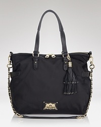 This nylon Juicy Couture satchel is trimmed in lightly textured leather and styled with a top zip closure.