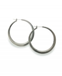 Style&co.'s tapered hoop earrings are a versatile, casually classic look that works for any time of year. Made in hematite tone mixed metal. Approximate diameter: 1-1/4 inches. Style&co.'s tapered hoop earrings are a versatile, casually classic look that works for any time of year. Made in hematite tone mixed metal. Approximate diameter: 1-1/4 inches.