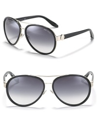 The classic aviator gets an update with thick rimmed lenses and a thin, almost invisible double bridge design. The classic aviator gets an update with thick rimmed lenses and a thin, almost invisible double bridge design.