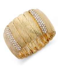 Slip on crystal sparkle with this cuff bracelet from Alfani. The rectangular link design is prettied up with glass stone accents. Stretches to fit wrist. Crafted in gold tone mixed metal. Approximate diameter: 2-1/4 inches. Slip on crystal sparkle with this cuff bracelet from Alfani. The rectangular link design is prettied up with glass stone accents. Stretches to fit wrist. Crafted in gold tone mixed metal. Approximate diameter: 2-1/4 inches.
