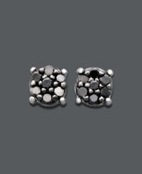 Chic clusters make a startling statement in bold, black hues. Seven, round-cut black diamonds (1/10 ct. t.w.) comprise these stunning stud earrings. Crafted in 14k white gold. Approximate diameter: 4 mm. Chic clusters make a startling statement in bold, black hues. Seven, round-cut black diamonds (1/10 ct. t.w.) comprise these stunning stud earrings. Crafted in 14k white gold. Approximate diameter: 4 mm.