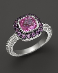 A sterling silver ring with cushion-cut pink corundum stone and amethyst pave frame. By Judith Ripka. A sterling silver ring with cushion-cut pink corundum stone and amethyst pave frame. By Judith Ripka.