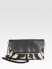 Luxurious solid and zebra-print leather with radiant hardware and a versatile detachable strap.Adjustable chain and leather shoulder strap, 19½-22 dropSnap flap closureTwo inner compartmentsOne inside zip pocketFully lined9W X 5½H X 1½DMade in Italy Luxurious solid and zebra-print leather with radiant hardware and a versatile detachable strap.Adjustable chain and leather shoulder strap, 19½-22 dropSnap flap closureTwo inner compartmentsOne inside zip pocketFully lined9W X 5½H X 1½DMade in Italy