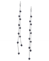 Fire up your evening with these two-row linear earrings from GUESS. Black diamond-embellished fireballs hang from metal chains. Crafted in hematite tone mixed metal. Approximate drop: 7 inches. Fire up your evening with these two-row linear earrings from GUESS. Black diamond-embellished fireballs hang from metal chains. Crafted in hematite tone mixed metal. Approximate drop: 7 inches.