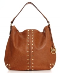 Elegance with attitude, this classic shoulder bag silhouette from MICHAEL Michael Kors is outfitted with golden stud accents and signature hardware. Ultra-spacious and crafted from butter-soft leather, it's the perfect go-to accessory of the season. Elegance with attitude, this classic shoulder bag silhouette from MICHAEL Michael Kors is outfitted with golden stud accents and signature hardware. Ultra-spacious and crafted from butter-soft leather, it's the perfect go-to accessory of the season.