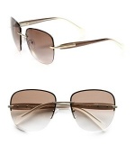 Sleek rimless design with a chic mix of acetate and metal. Available in pale gold/brown with brown gradient lens, black with grey gradient lens or red with rose gradient lens. Logo temples100% UV protectionMade in Italy 