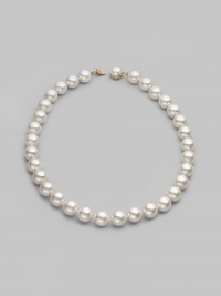 Elegant organic white man-made pearls make a perfect finishing touch. 14mm white round pearls Length, about 20 Mabé pearl and 18k gold vermeil push-lock clasp Made in Spain Elegant organic white man-made pearls make a perfect finishing touch. 14mm white round pearls Length, about 20 Mabé pearl and 18k gold vermeil push-lock clasp Made in Spain